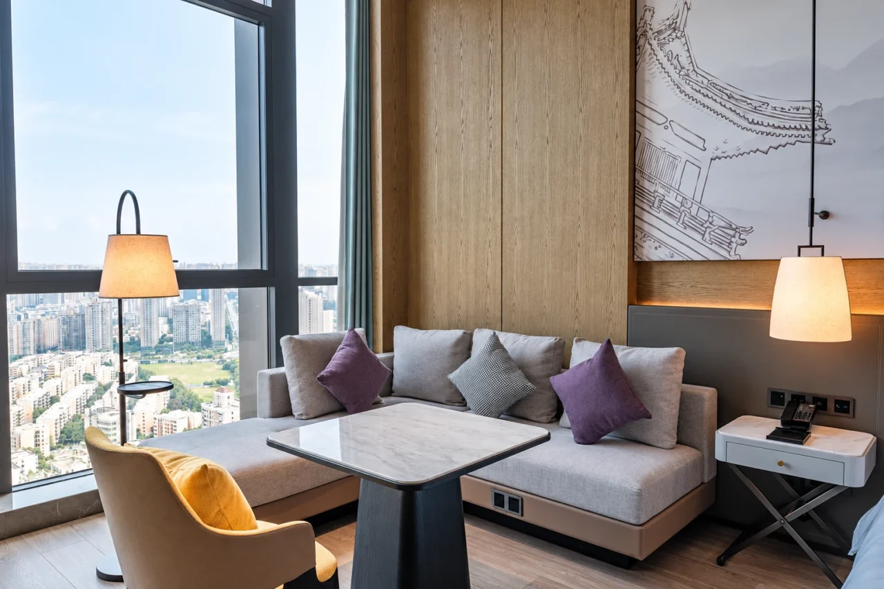 Hotel seating area with coordinated floor and pendant lamps